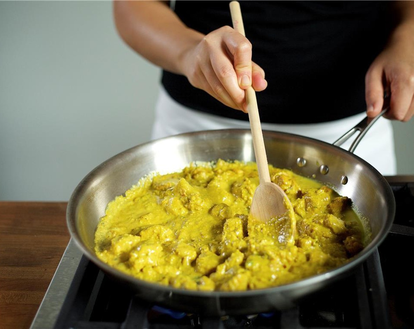 Schritt 11 Die Sahne-Nuss-Mischung hinzufügen und neun Minuten unter gelegentlichem Umrühren kochen.