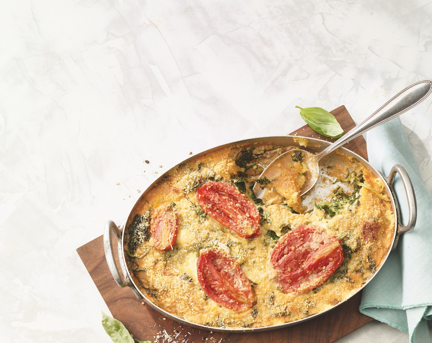 Spinat-Polenta-Auflauf mit Tomaten und Käse