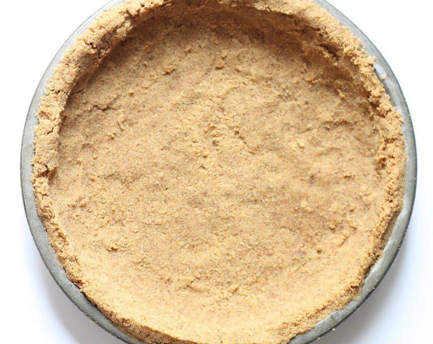 Schritt 4 Den Boden für 6–7 Minuten im vorgeheizten Ofen backen.