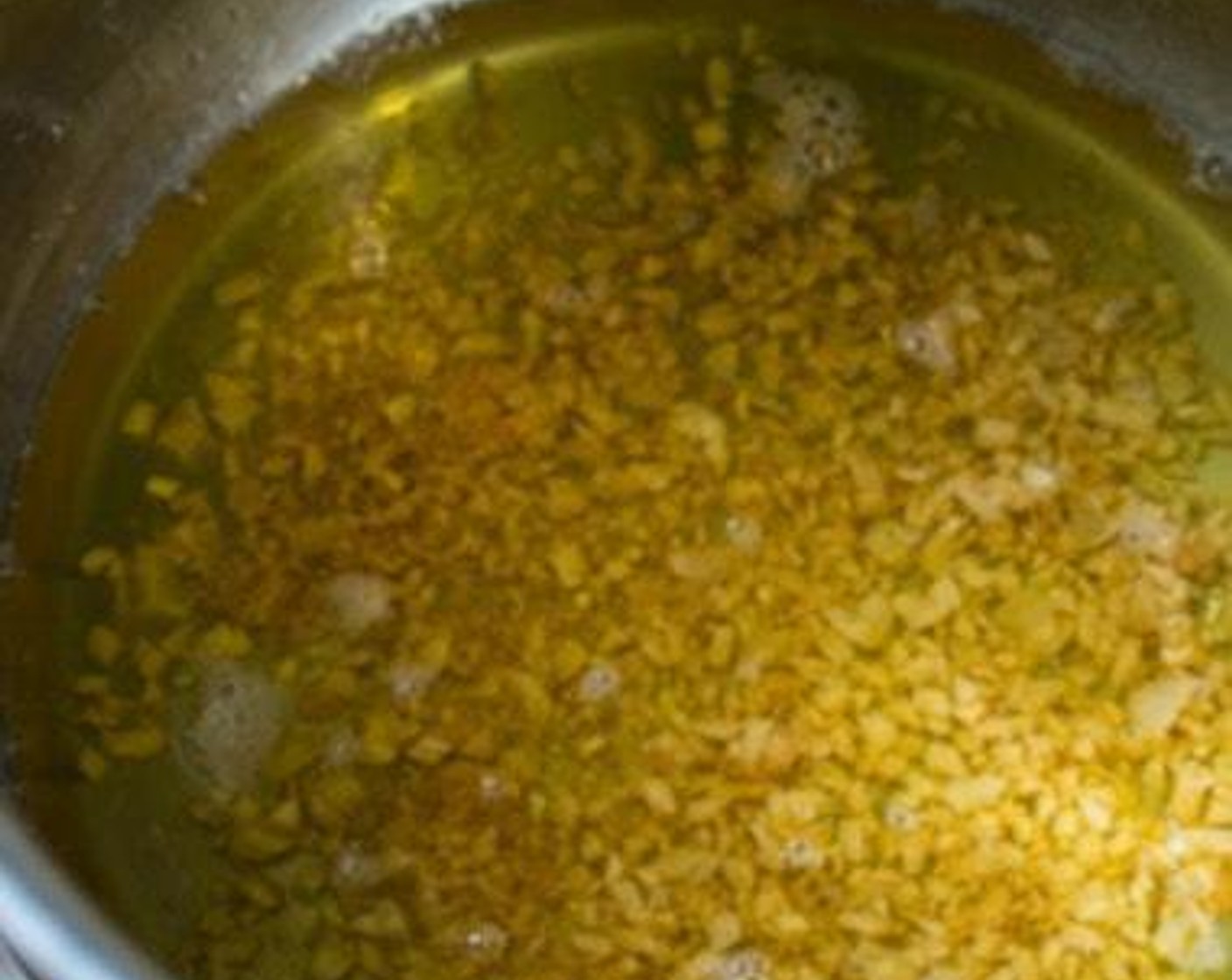 Schritt 3 Sobald der Knoblauch beginnt braun zu werden, Hitze abschalten.