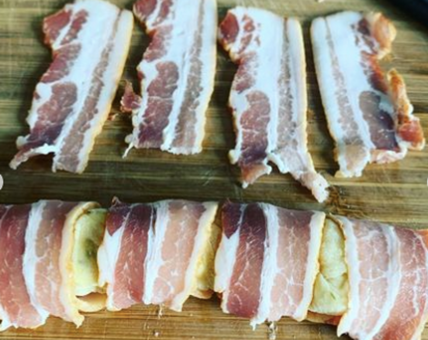 Schritt 7 Als nächstes Frühstücksspeck (8 Scheiben) halbieren und die Hackfleisch-Rolle damit ummanteln.