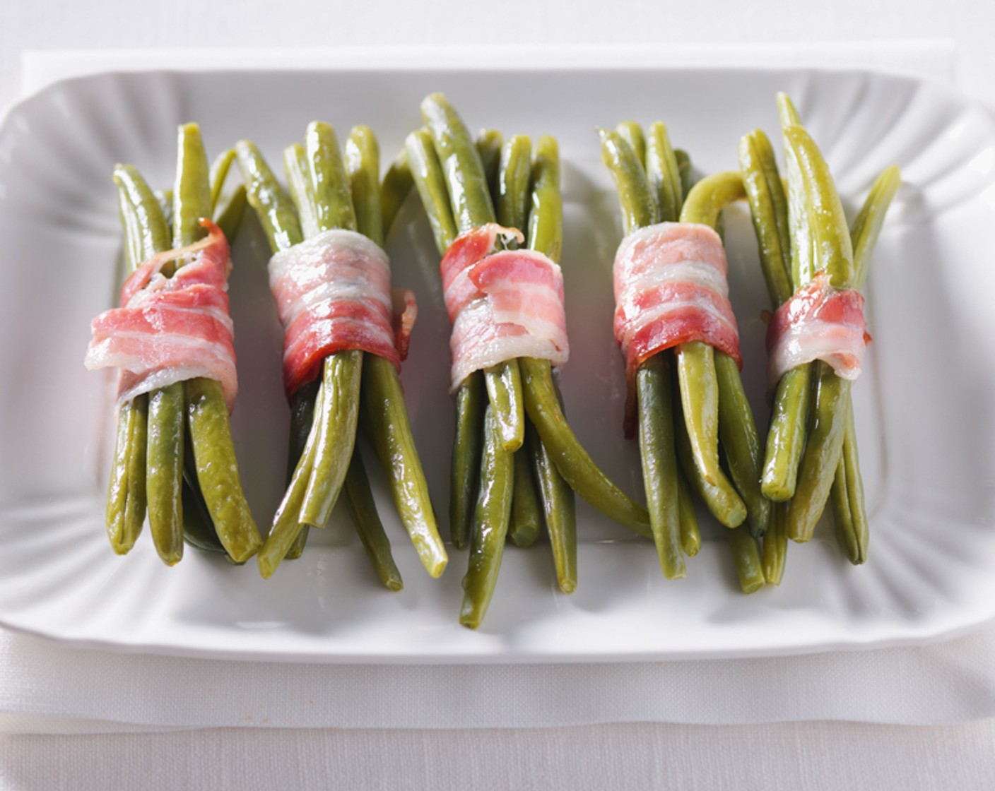 Bohnen im Speckmantel