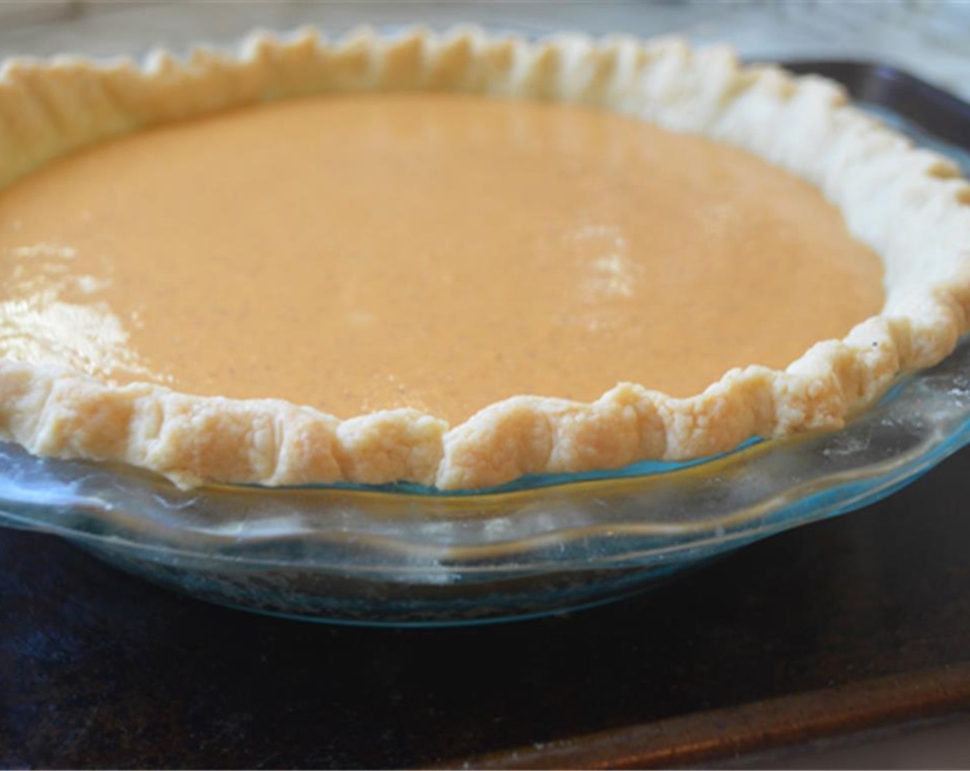 Schritt 13 Die Mischung in den vorgebackenen Teig giessen und bei 160 °C für 50–60 Minuten backen.